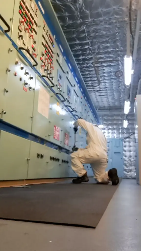 Engineer working in a vessel machinery space